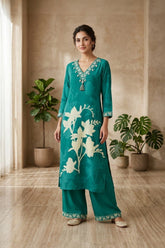 Elegant Teal Cotton Kurta Set with Floral Print & Tassel Neckline