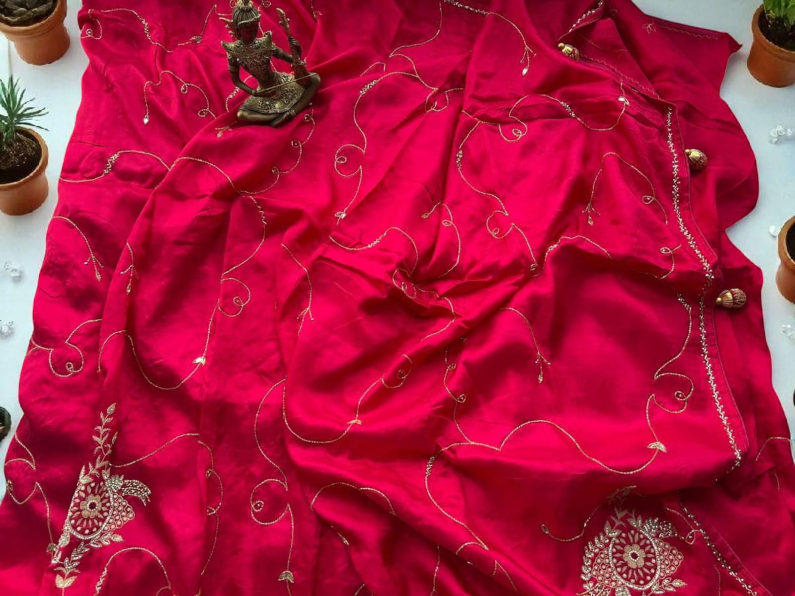 Rani Pink Saree with Delicate Embroidery and Tassel Detailing